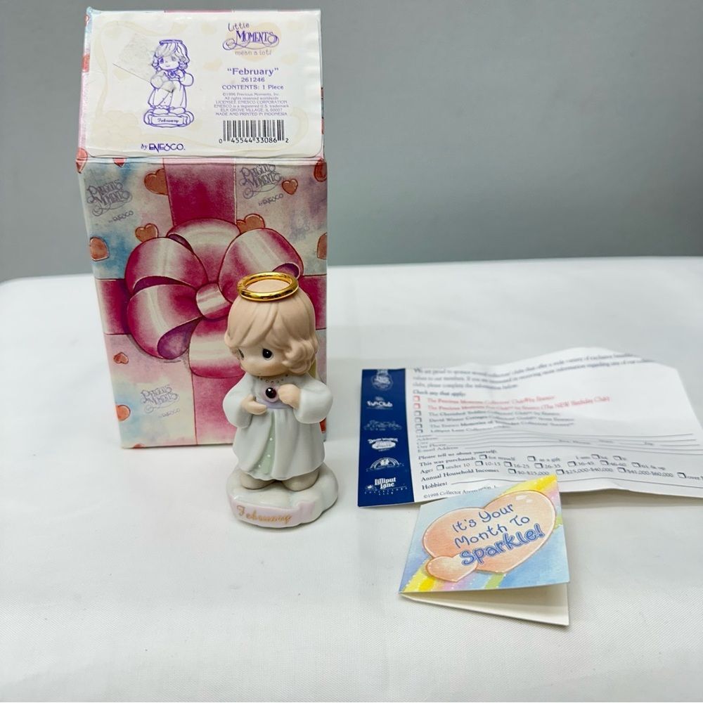 NIB Precious Moments February porcelain‎ figurine.